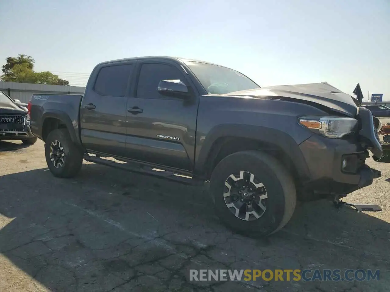 4 Photograph of a damaged car 3TMCZ5AN3KM223904 TOYOTA TACOMA 2019