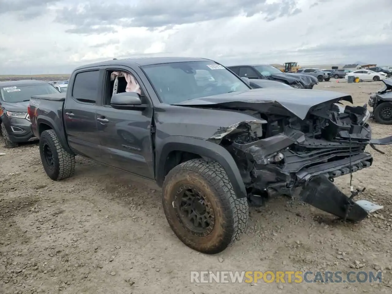 4 Photograph of a damaged car 3TMCZ5AN3KM225233 TOYOTA TACOMA 2019