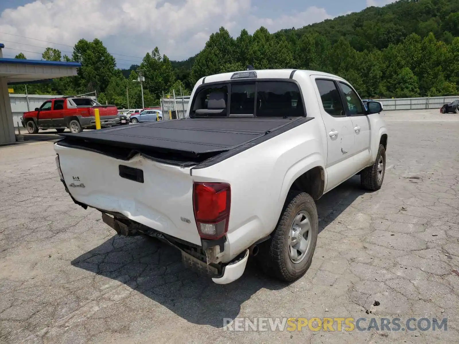 4 Photograph of a damaged car 3TMCZ5AN3KM236460 TOYOTA TACOMA 2019