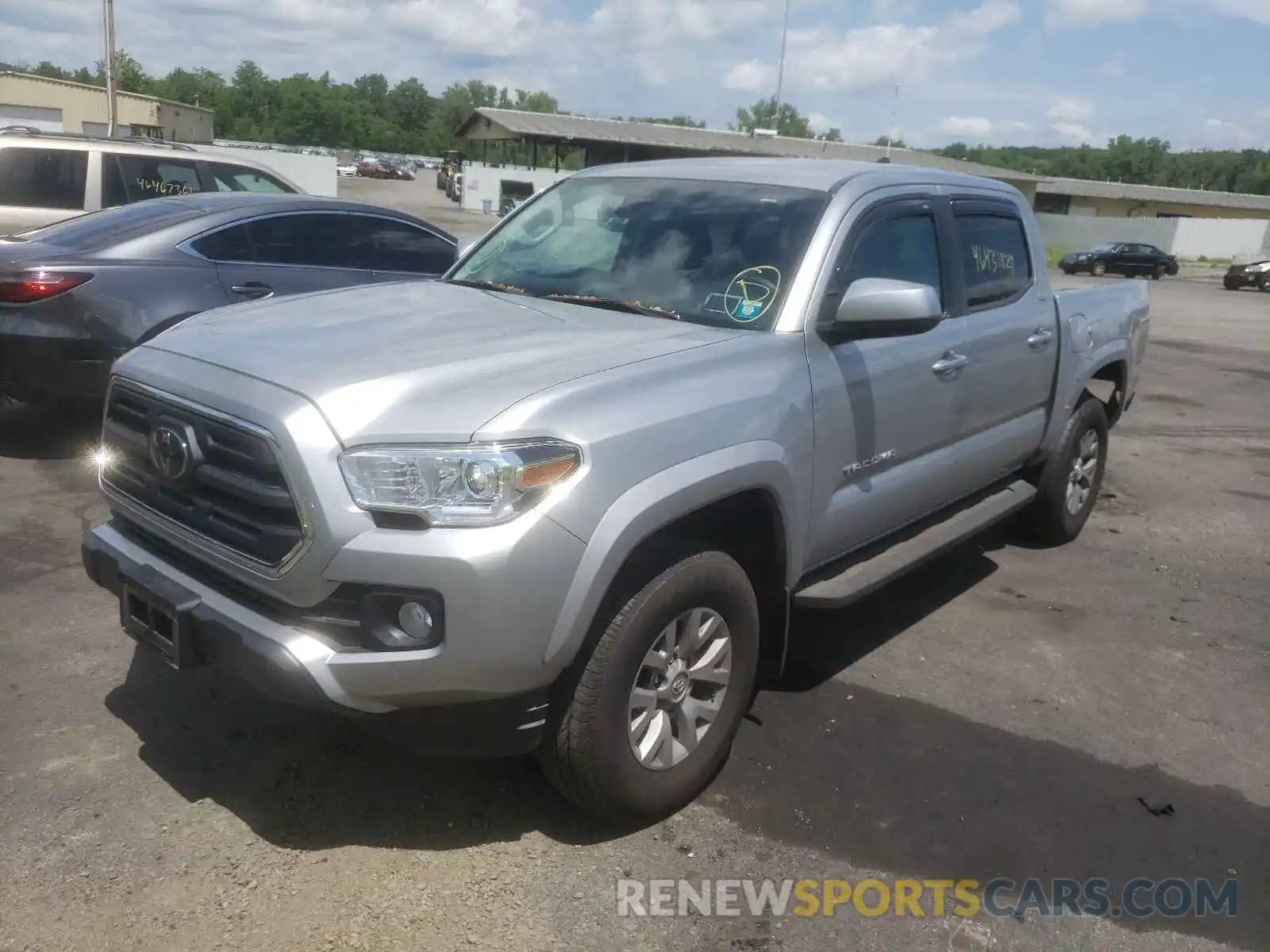 2 Photograph of a damaged car 3TMCZ5AN3KM249810 TOYOTA TACOMA 2019