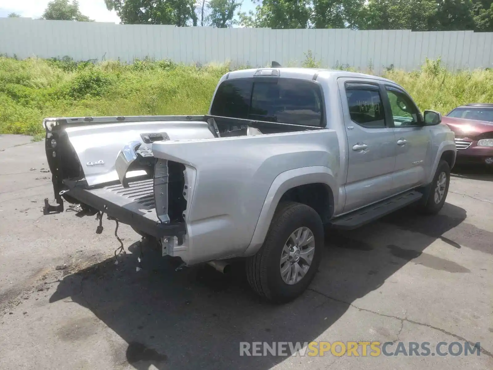 4 Photograph of a damaged car 3TMCZ5AN3KM249810 TOYOTA TACOMA 2019