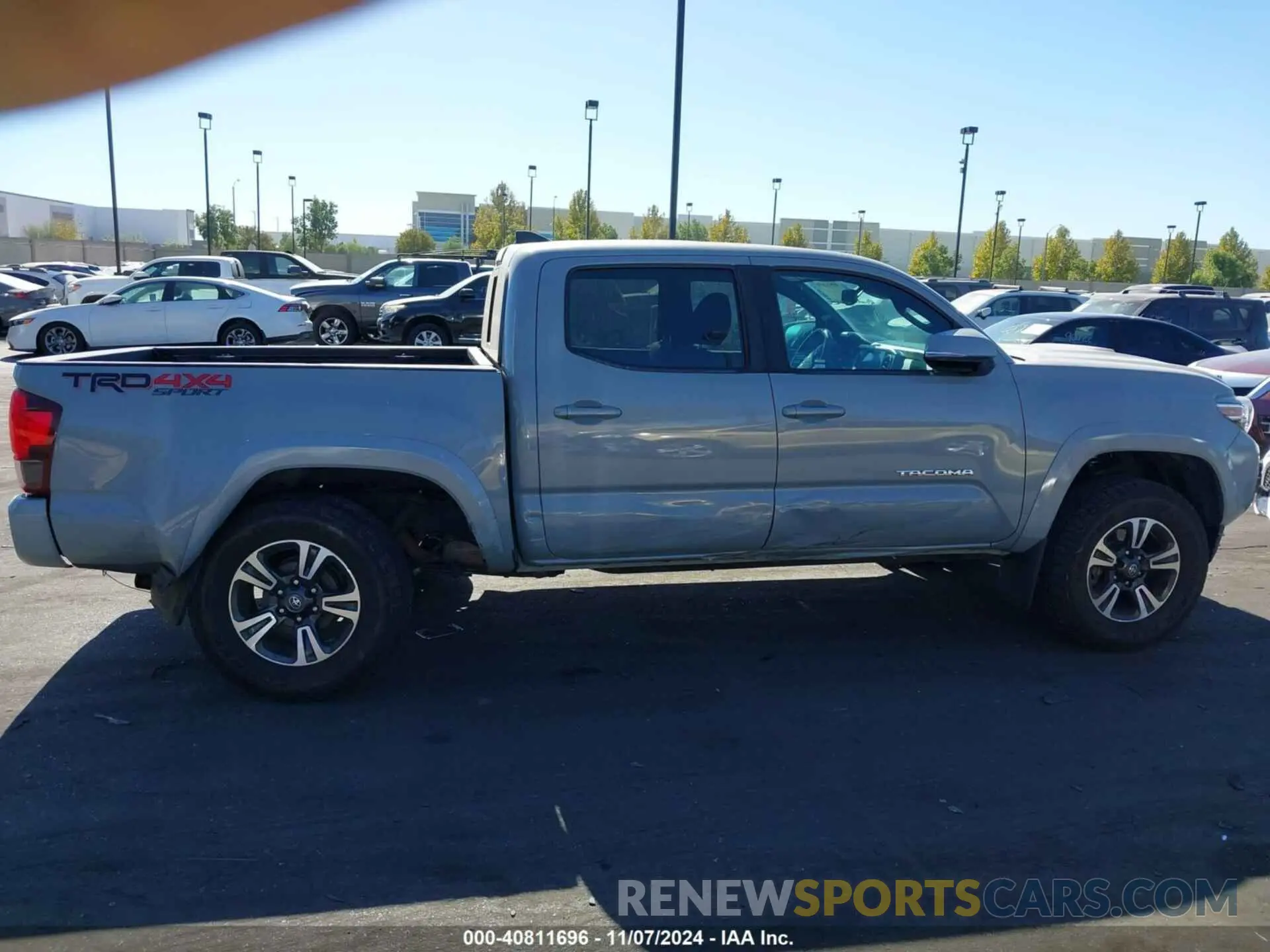 13 Photograph of a damaged car 3TMCZ5AN3KM260757 TOYOTA TACOMA 2019