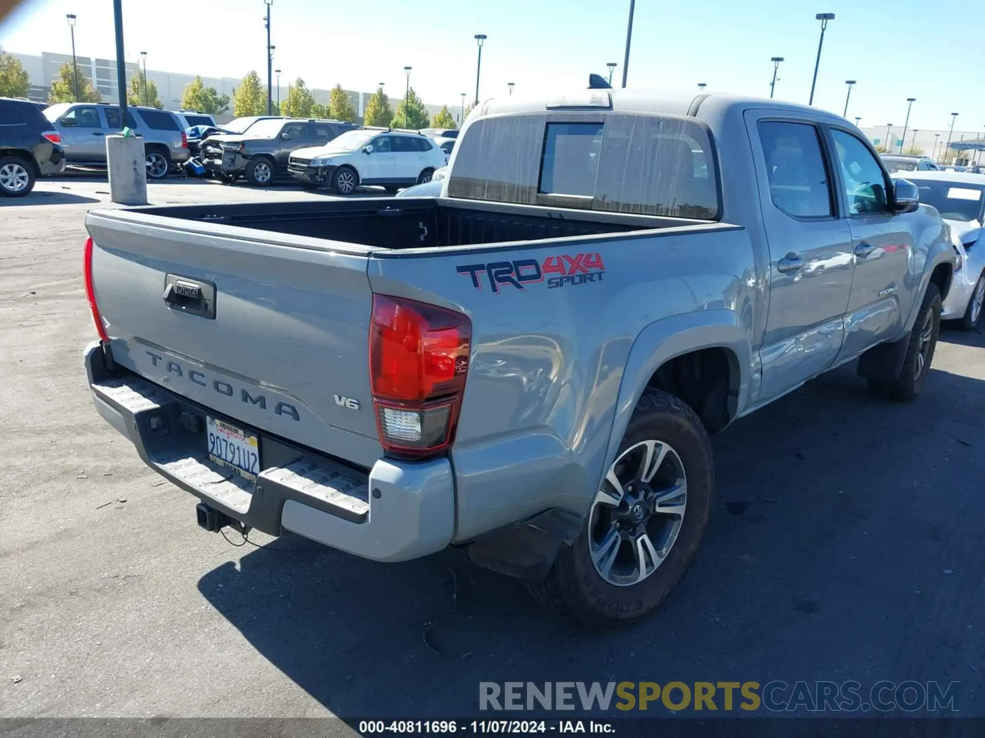 4 Photograph of a damaged car 3TMCZ5AN3KM260757 TOYOTA TACOMA 2019