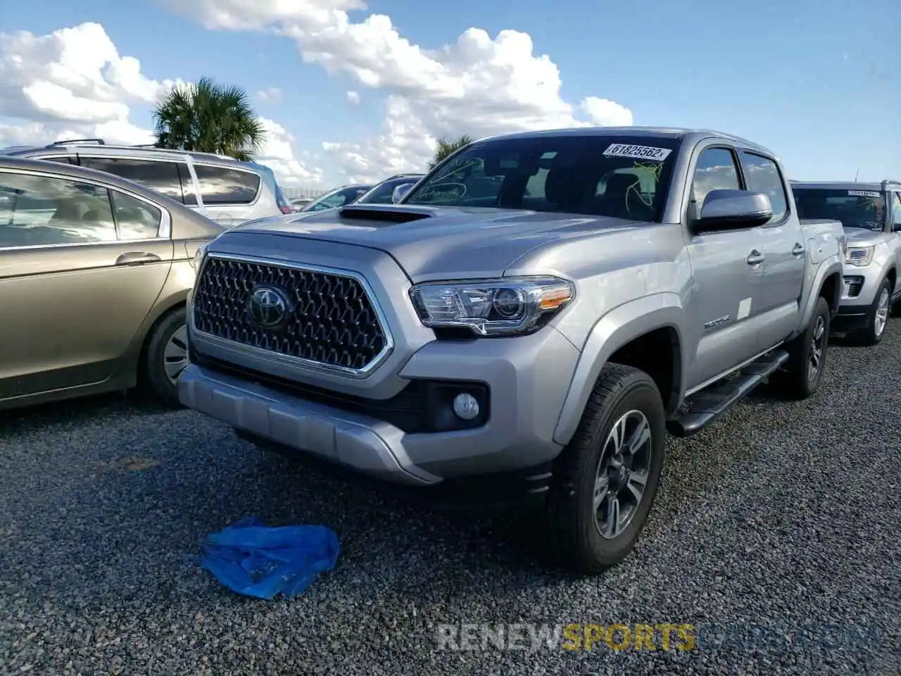 2 Photograph of a damaged car 3TMCZ5AN3KM275355 TOYOTA TACOMA 2019