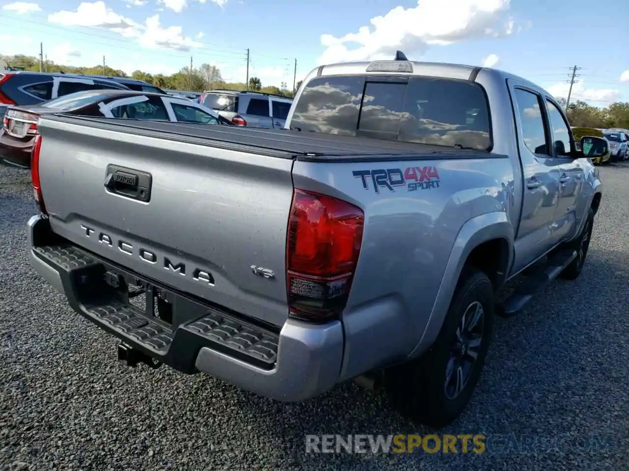 4 Photograph of a damaged car 3TMCZ5AN3KM275355 TOYOTA TACOMA 2019