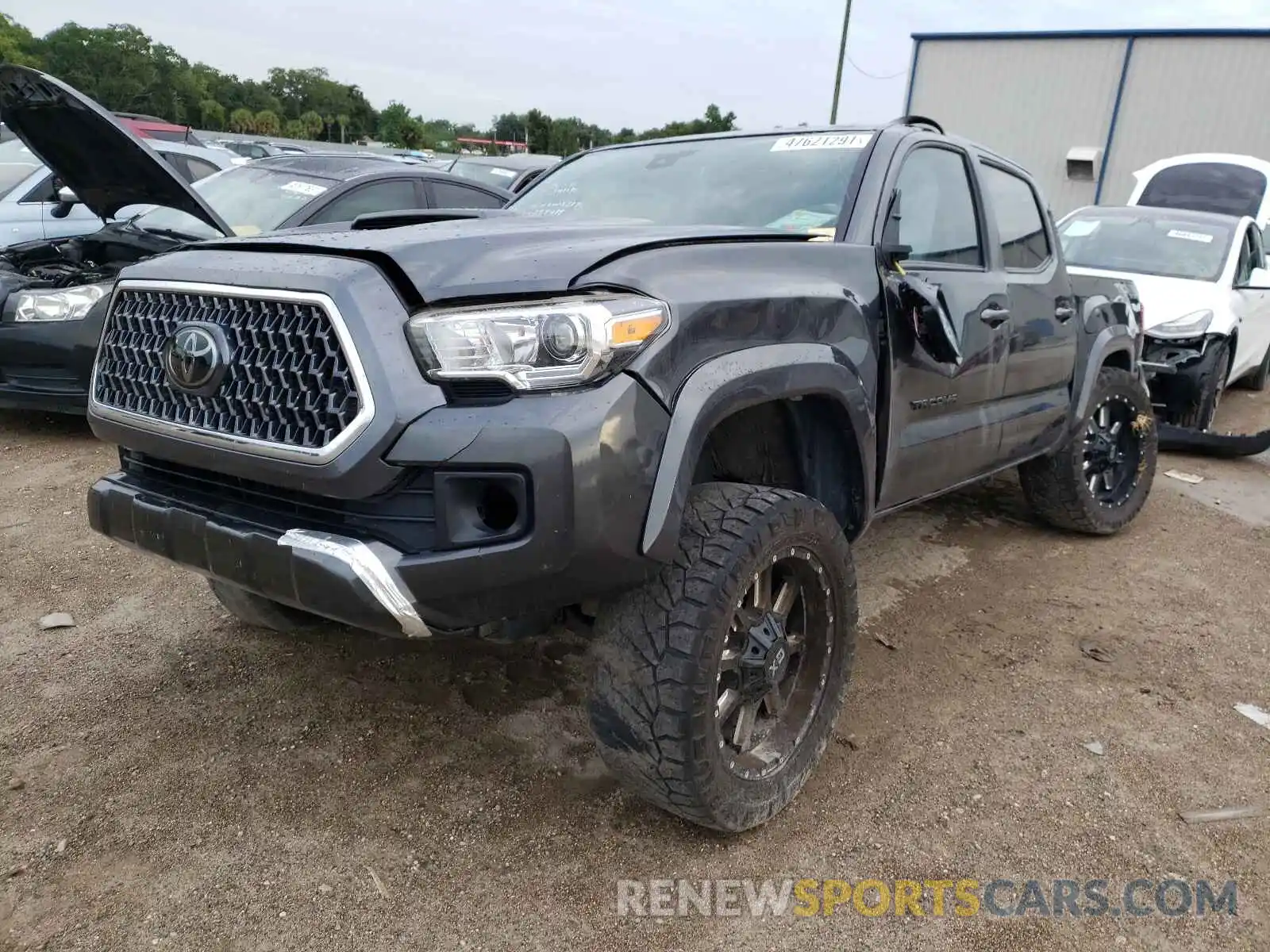 2 Photograph of a damaged car 3TMCZ5AN3KM284489 TOYOTA TACOMA 2019