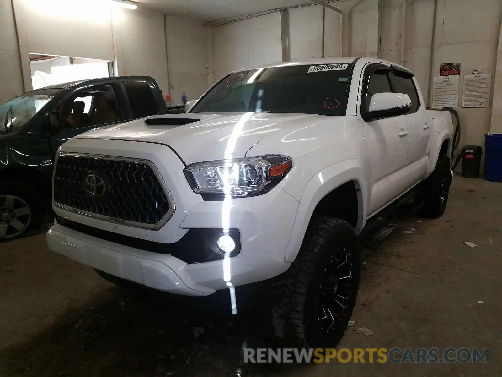 2 Photograph of a damaged car 3TMCZ5AN4KM195952 TOYOTA TACOMA 2019