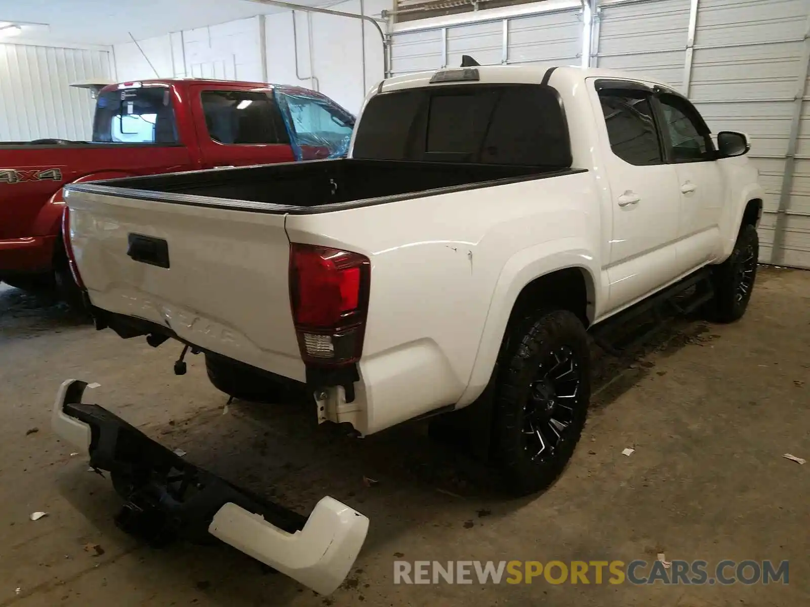 4 Photograph of a damaged car 3TMCZ5AN4KM195952 TOYOTA TACOMA 2019