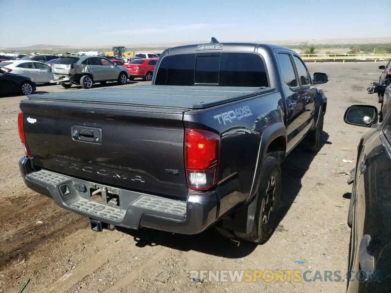 4 Photograph of a damaged car 3TMCZ5AN4KM213432 TOYOTA TACOMA 2019