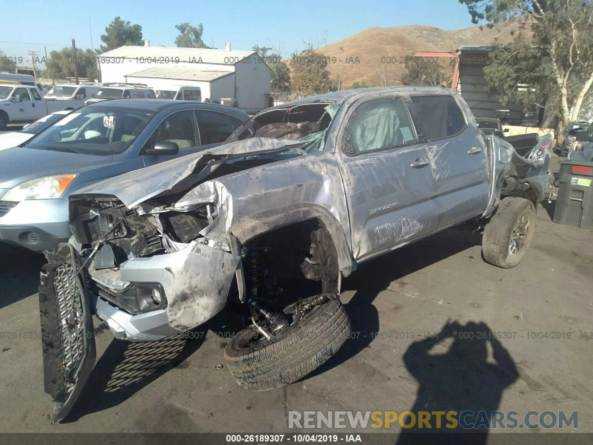 2 Photograph of a damaged car 3TMCZ5AN4KM225970 TOYOTA TACOMA 2019