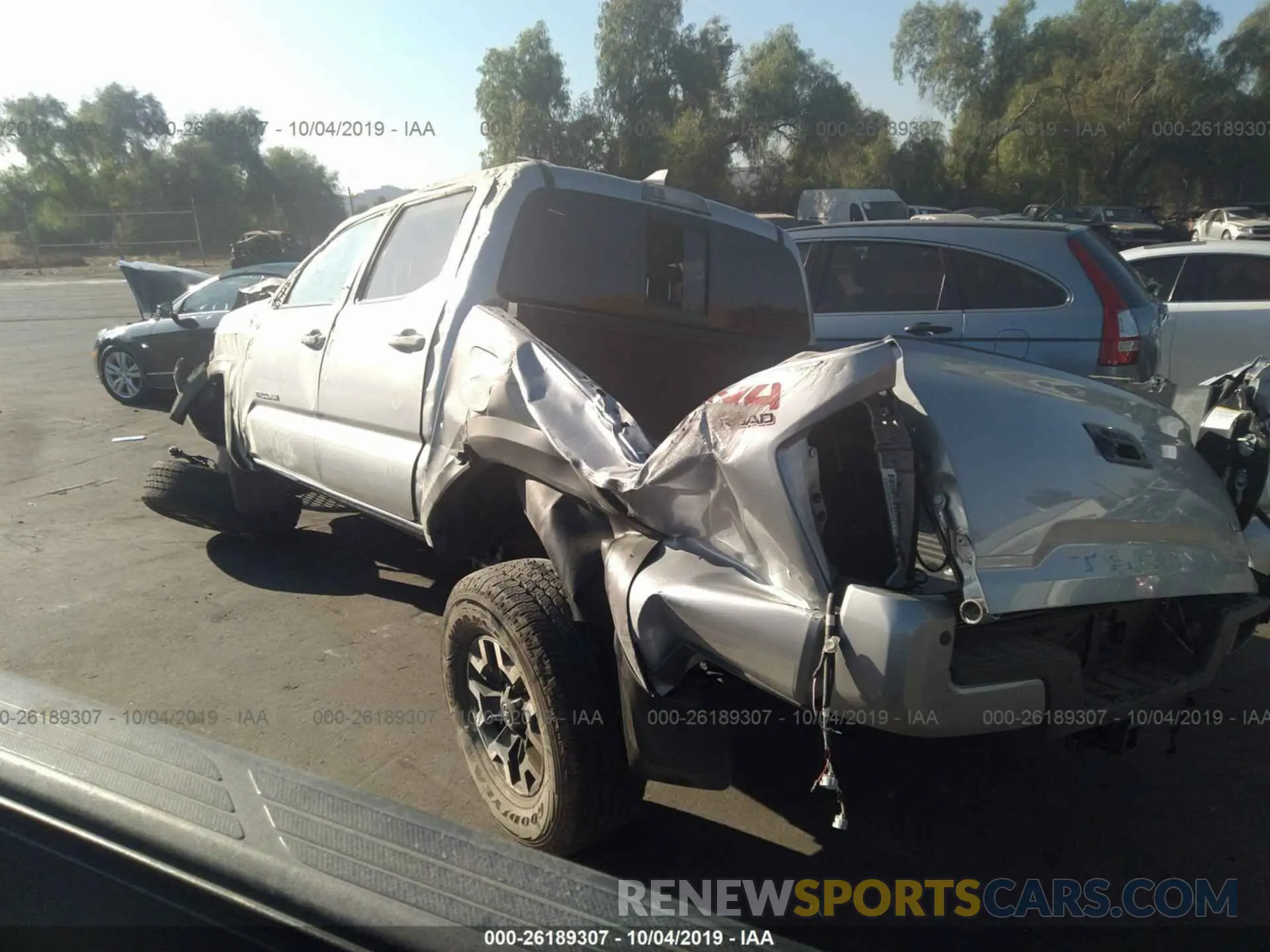 3 Photograph of a damaged car 3TMCZ5AN4KM225970 TOYOTA TACOMA 2019