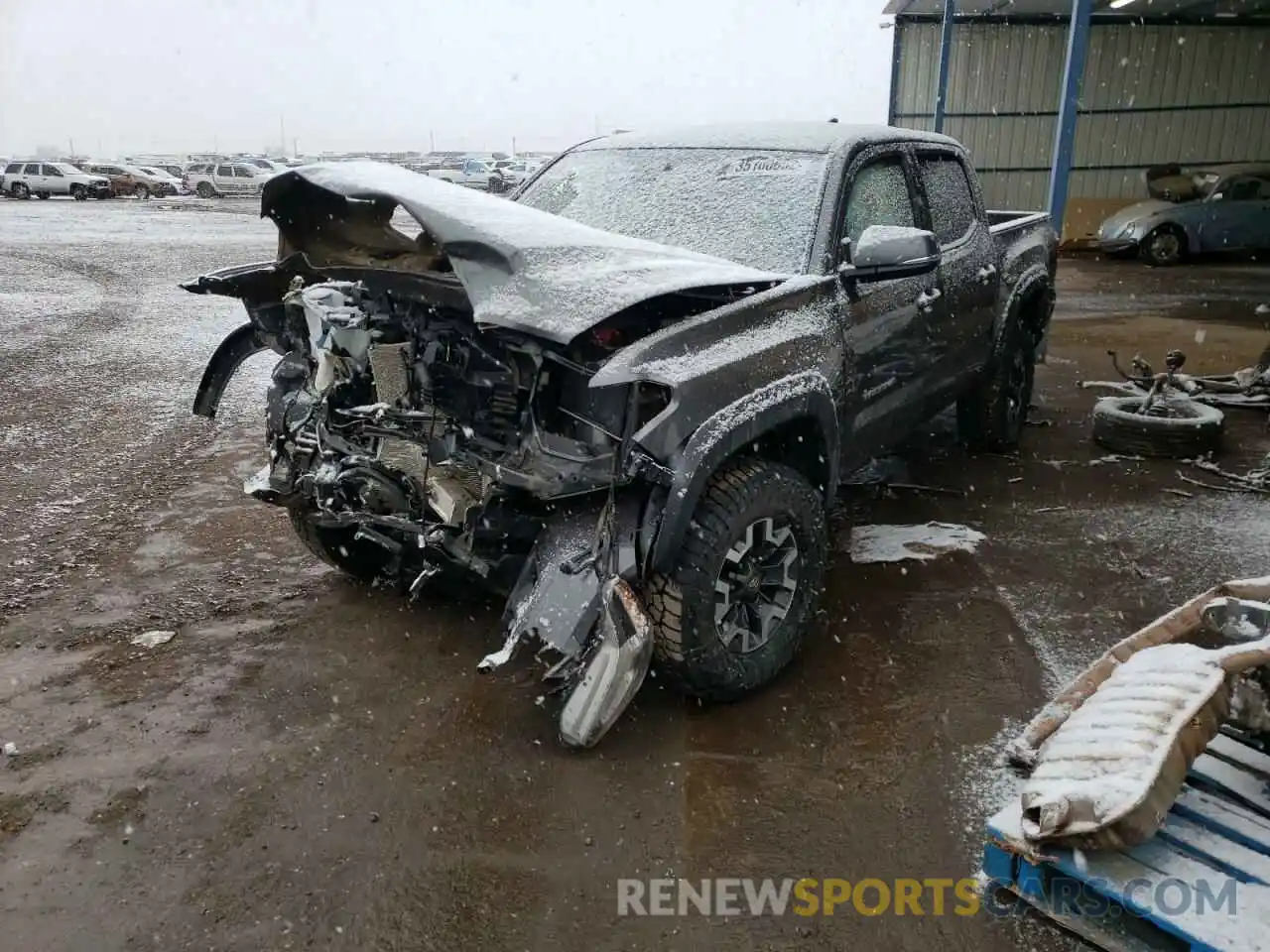 2 Photograph of a damaged car 3TMCZ5AN4KM233809 TOYOTA TACOMA 2019