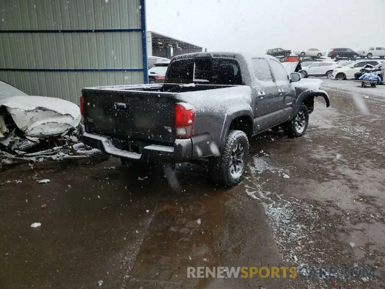 4 Photograph of a damaged car 3TMCZ5AN4KM233809 TOYOTA TACOMA 2019