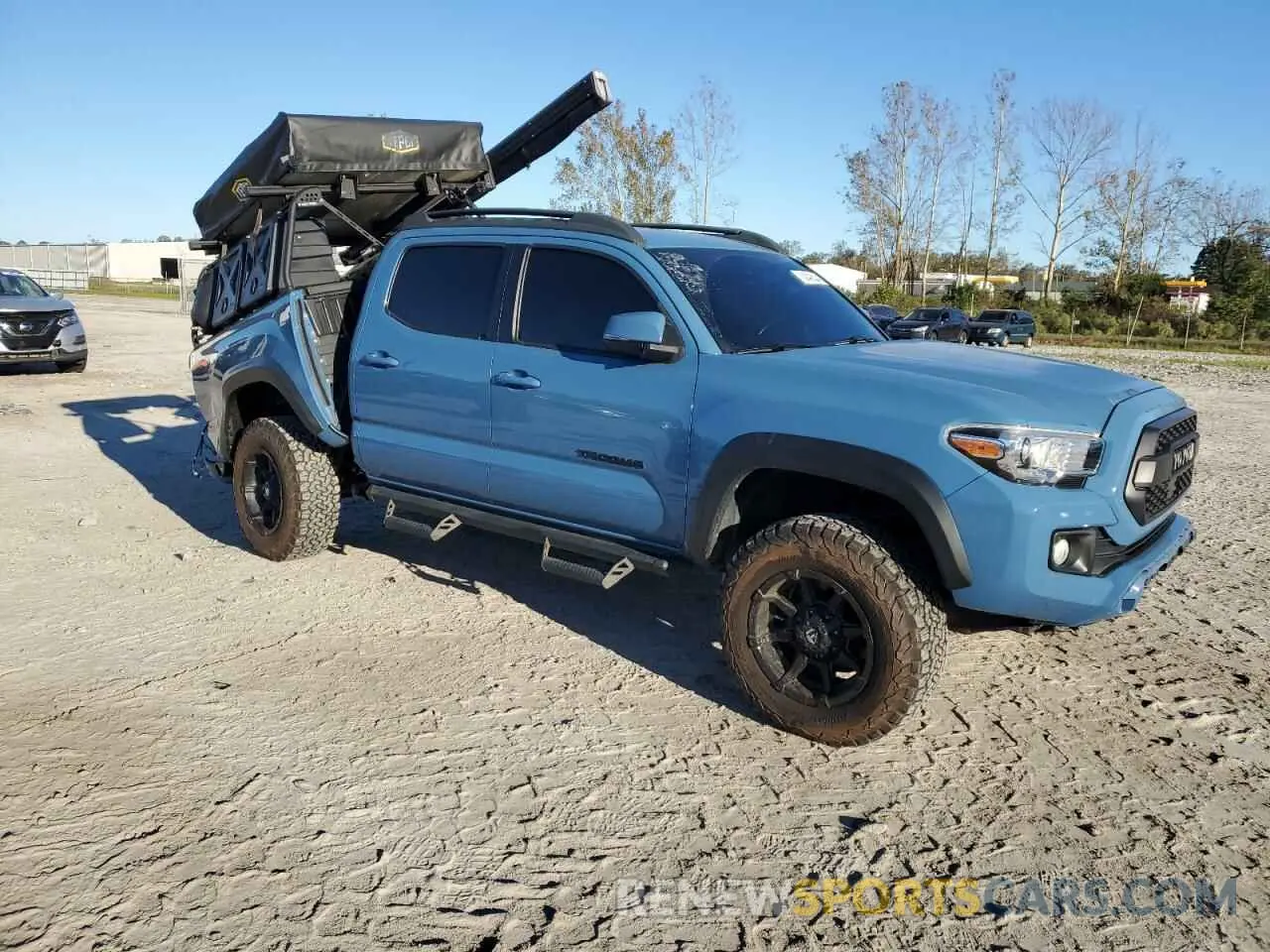 4 Photograph of a damaged car 3TMCZ5AN4KM242235 TOYOTA TACOMA 2019