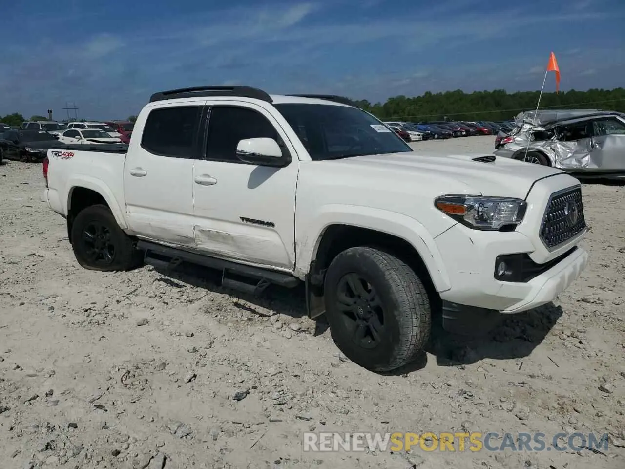 4 Photograph of a damaged car 3TMCZ5AN4KM248245 TOYOTA TACOMA 2019