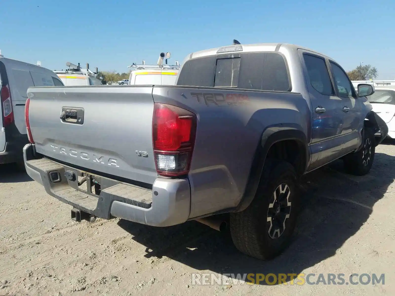 4 Photograph of a damaged car 3TMCZ5AN4KM256782 TOYOTA TACOMA 2019