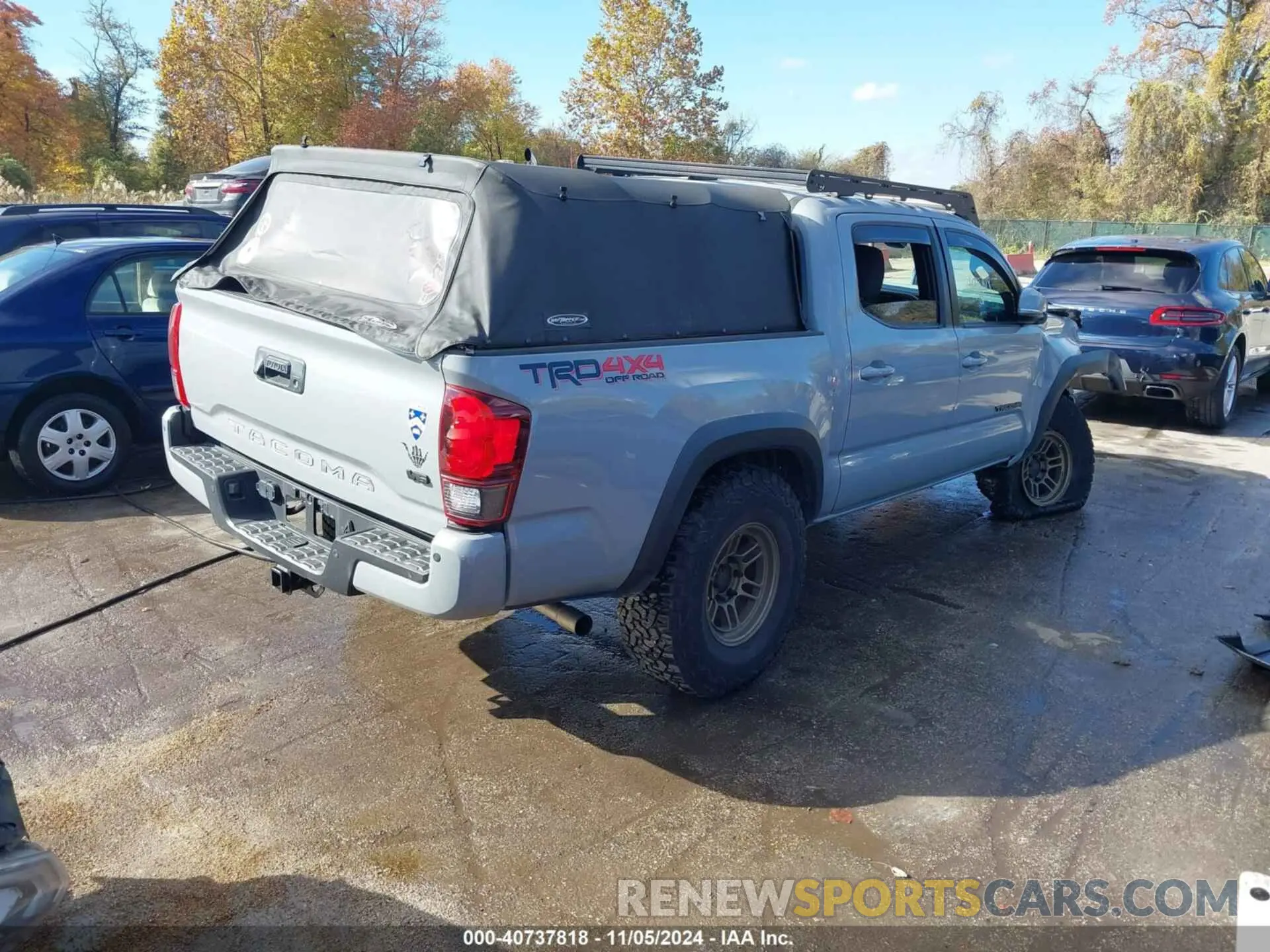 4 Photograph of a damaged car 3TMCZ5AN4KM265935 TOYOTA TACOMA 2019