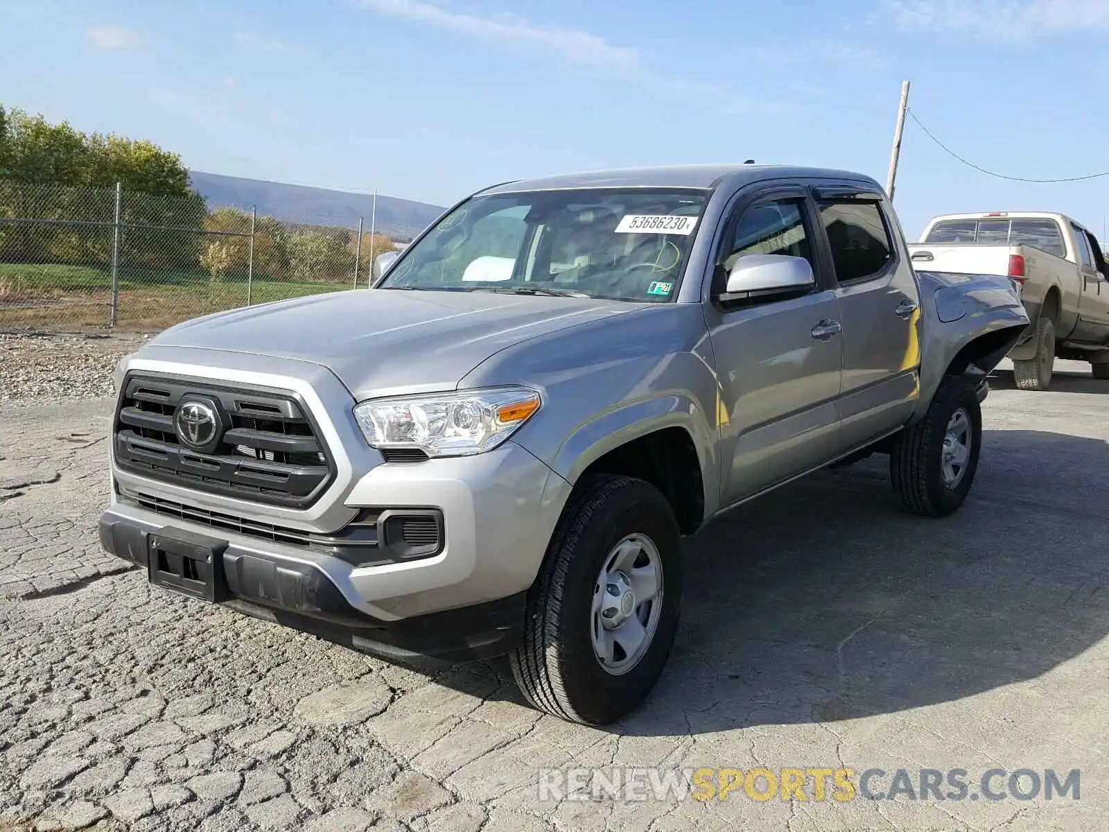 2 Photograph of a damaged car 3TMCZ5AN4KM282184 TOYOTA TACOMA 2019