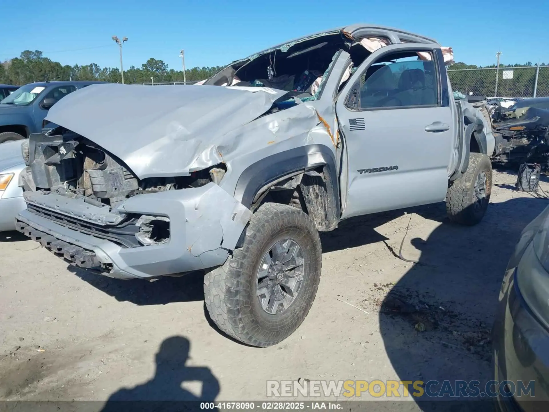 2 Photograph of a damaged car 3TMCZ5AN5KM199346 TOYOTA TACOMA 2019