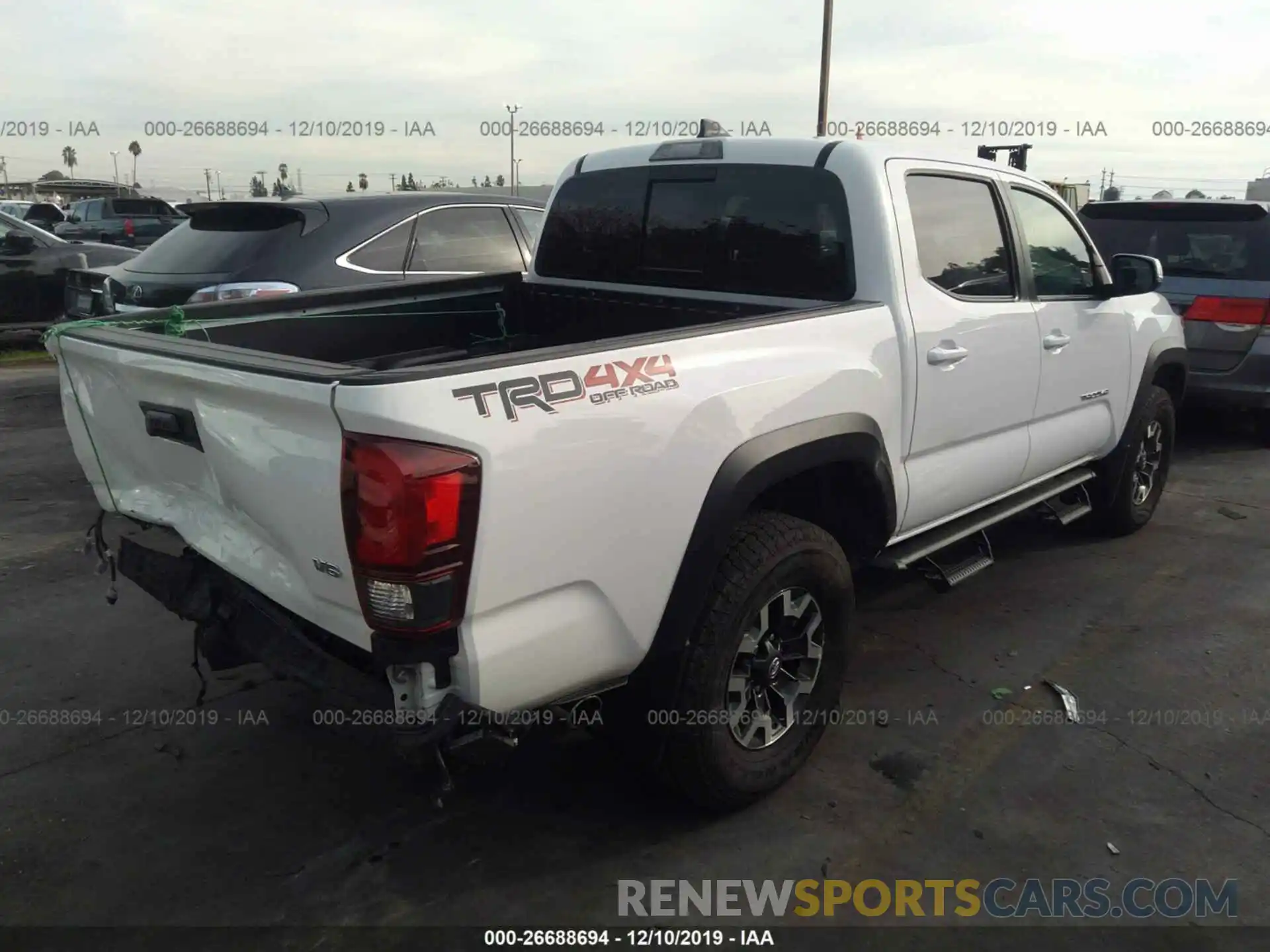 4 Photograph of a damaged car 3TMCZ5AN5KM200642 TOYOTA TACOMA 2019