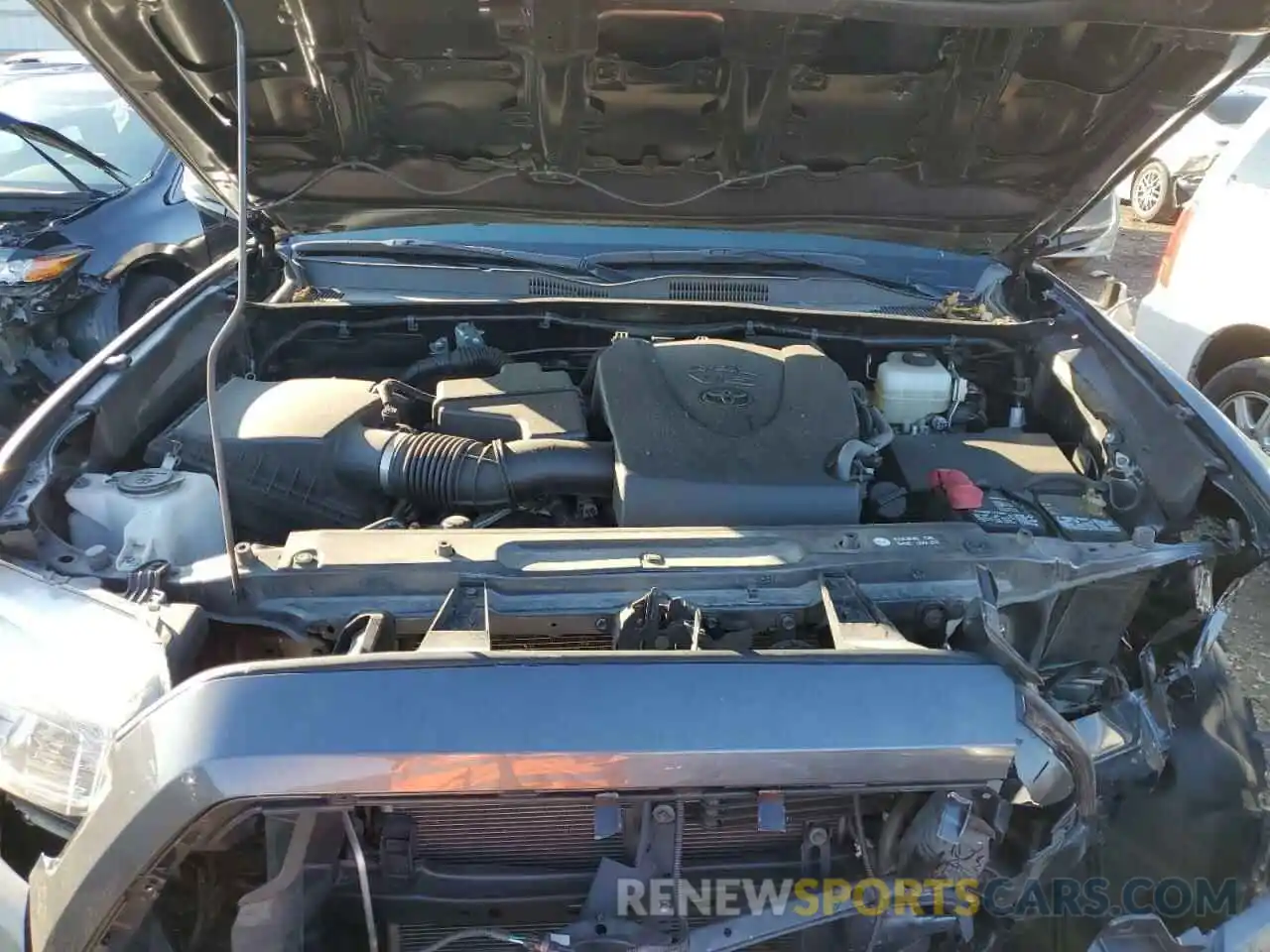 7 Photograph of a damaged car 3TMCZ5AN5KM215870 TOYOTA TACOMA 2019