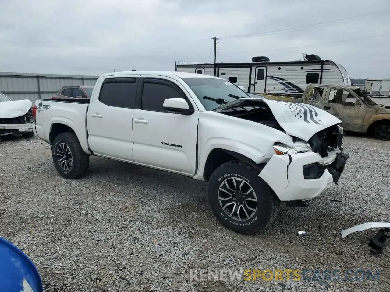 4 Photograph of a damaged car 3TMCZ5AN5KM221264 TOYOTA TACOMA 2019