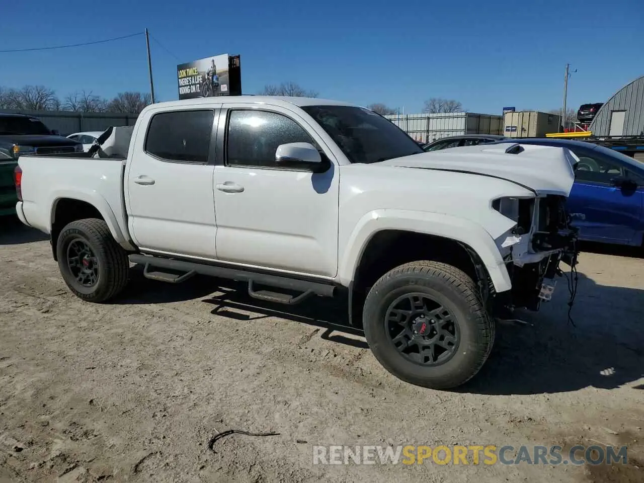 4 Photograph of a damaged car 3TMCZ5AN5KM238078 TOYOTA TACOMA 2019