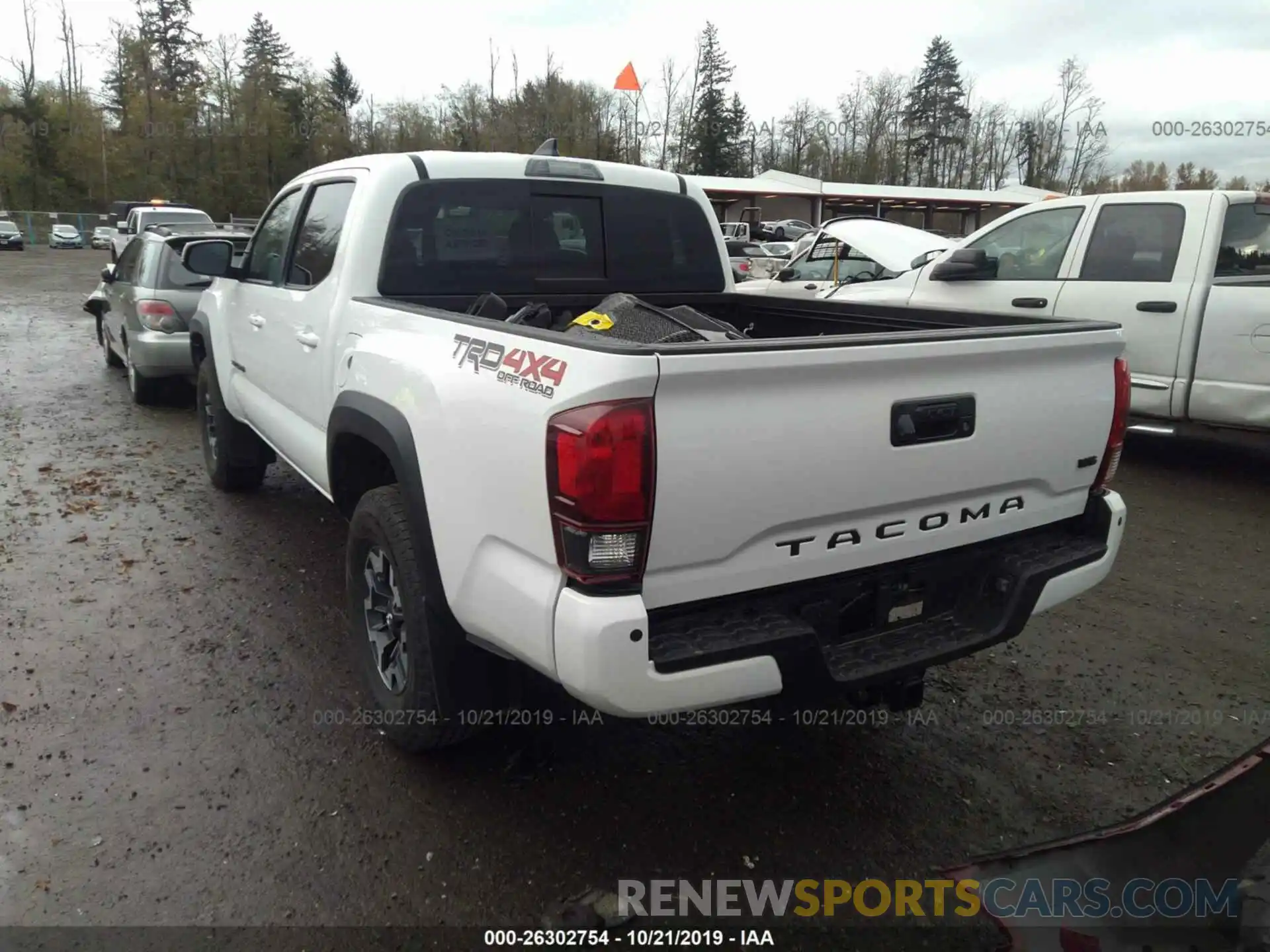 3 Photograph of a damaged car 3TMCZ5AN5KM269685 TOYOTA TACOMA 2019