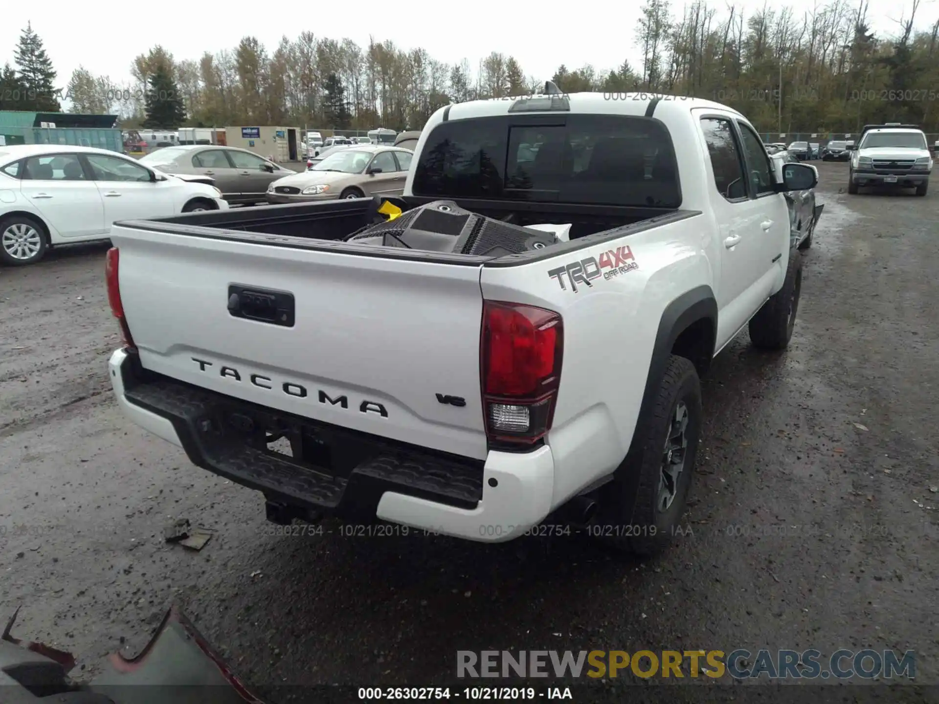 4 Photograph of a damaged car 3TMCZ5AN5KM269685 TOYOTA TACOMA 2019