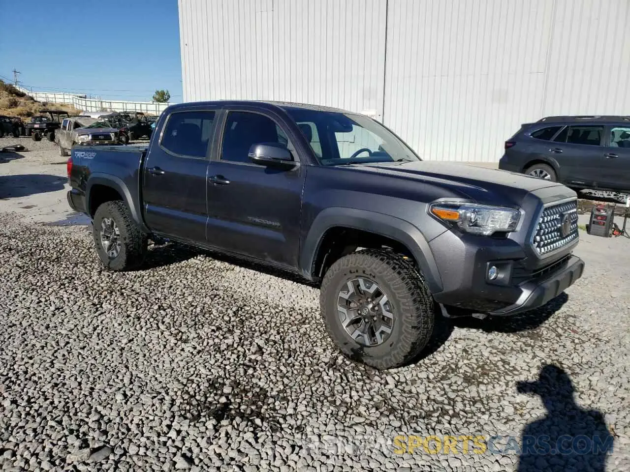 4 Photograph of a damaged car 3TMCZ5AN5KM287975 TOYOTA TACOMA 2019