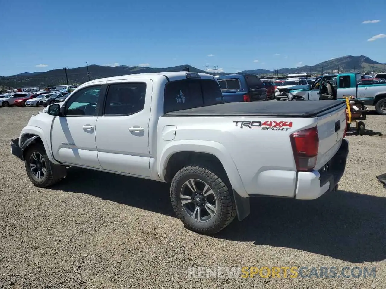 2 Photograph of a damaged car 3TMCZ5AN6KM199596 TOYOTA TACOMA 2019