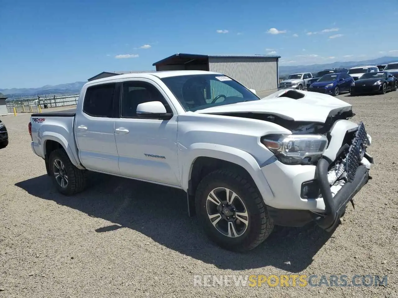 4 Photograph of a damaged car 3TMCZ5AN6KM199596 TOYOTA TACOMA 2019