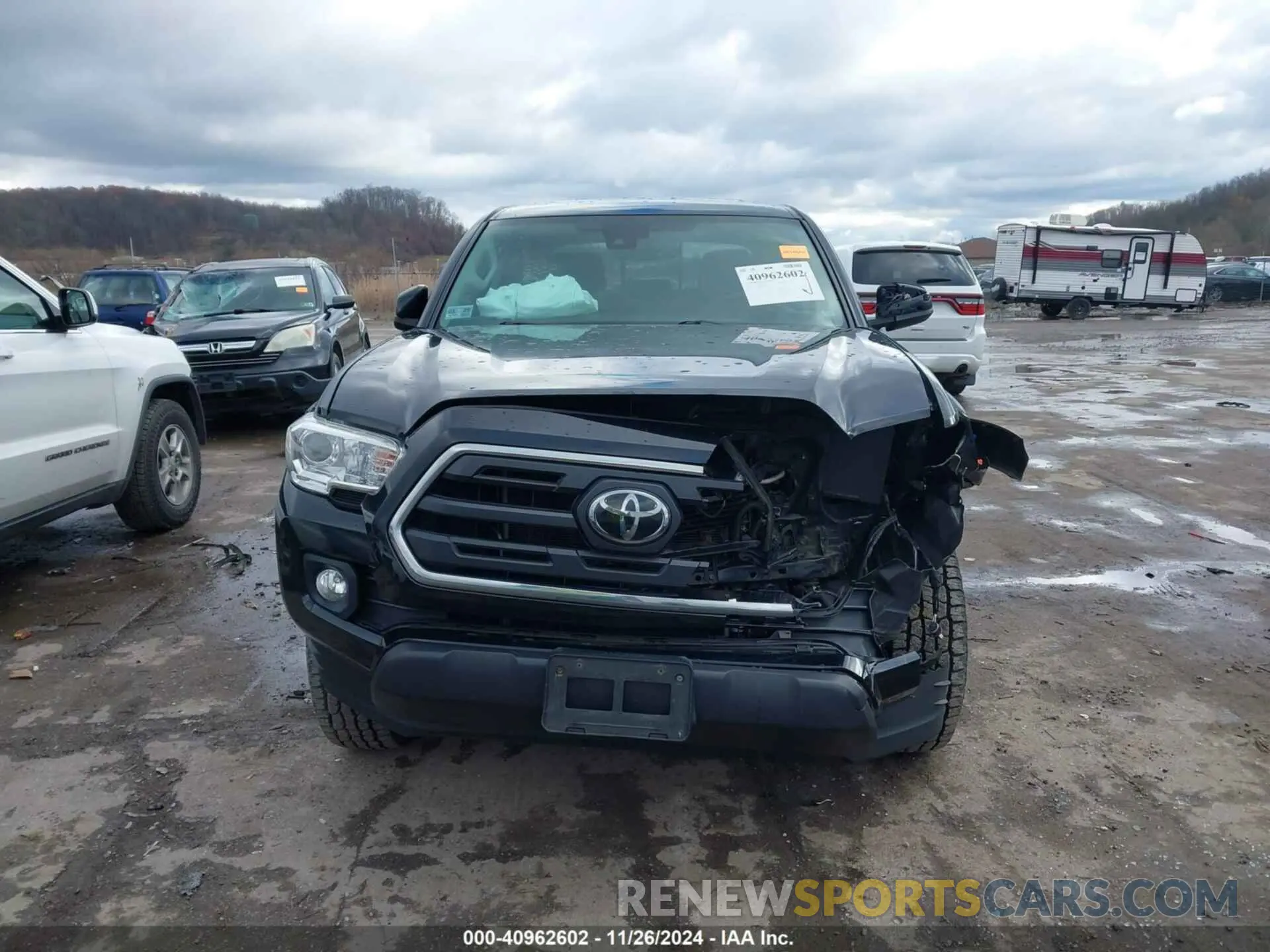 12 Photograph of a damaged car 3TMCZ5AN6KM203517 TOYOTA TACOMA 2019