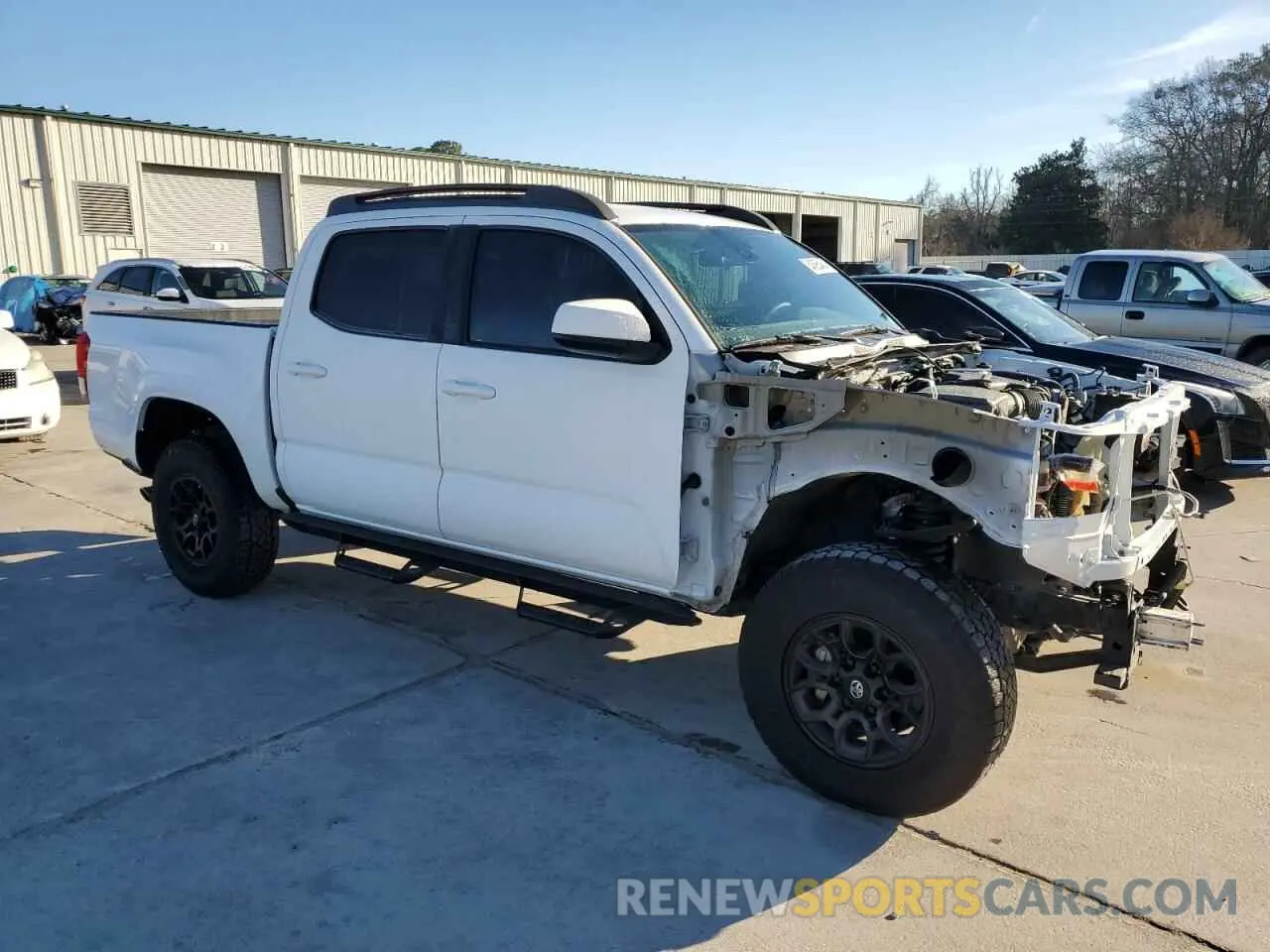 4 Photograph of a damaged car 3TMCZ5AN6KM204330 TOYOTA TACOMA 2019