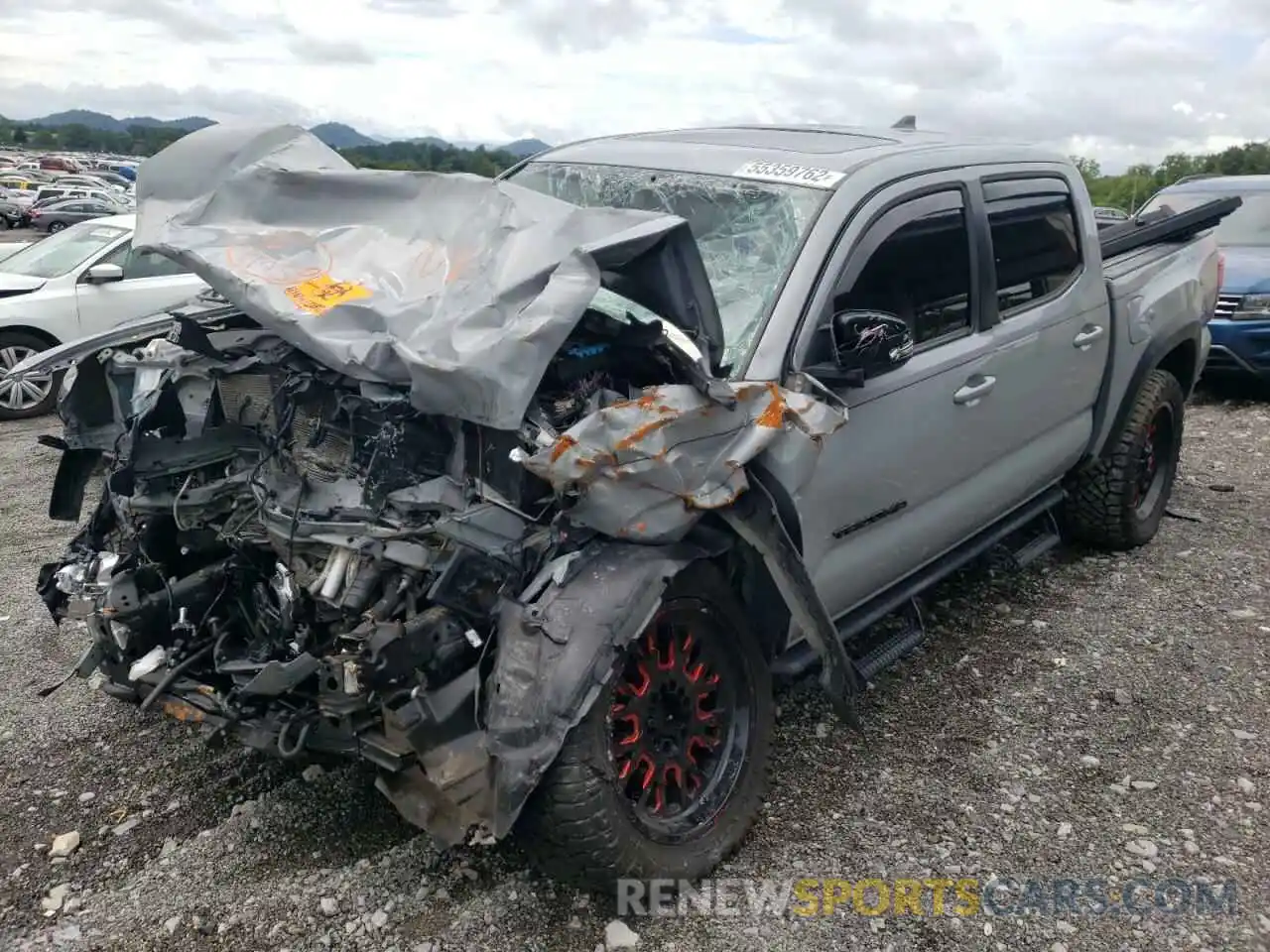 2 Photograph of a damaged car 3TMCZ5AN6KM213982 TOYOTA TACOMA 2019