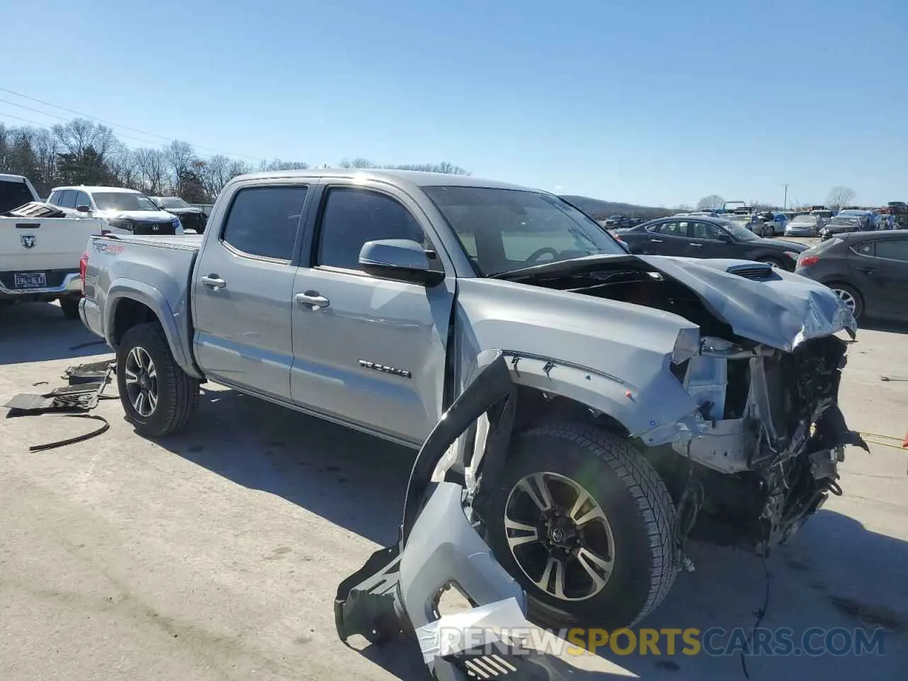 4 Photograph of a damaged car 3TMCZ5AN6KM217644 TOYOTA TACOMA 2019