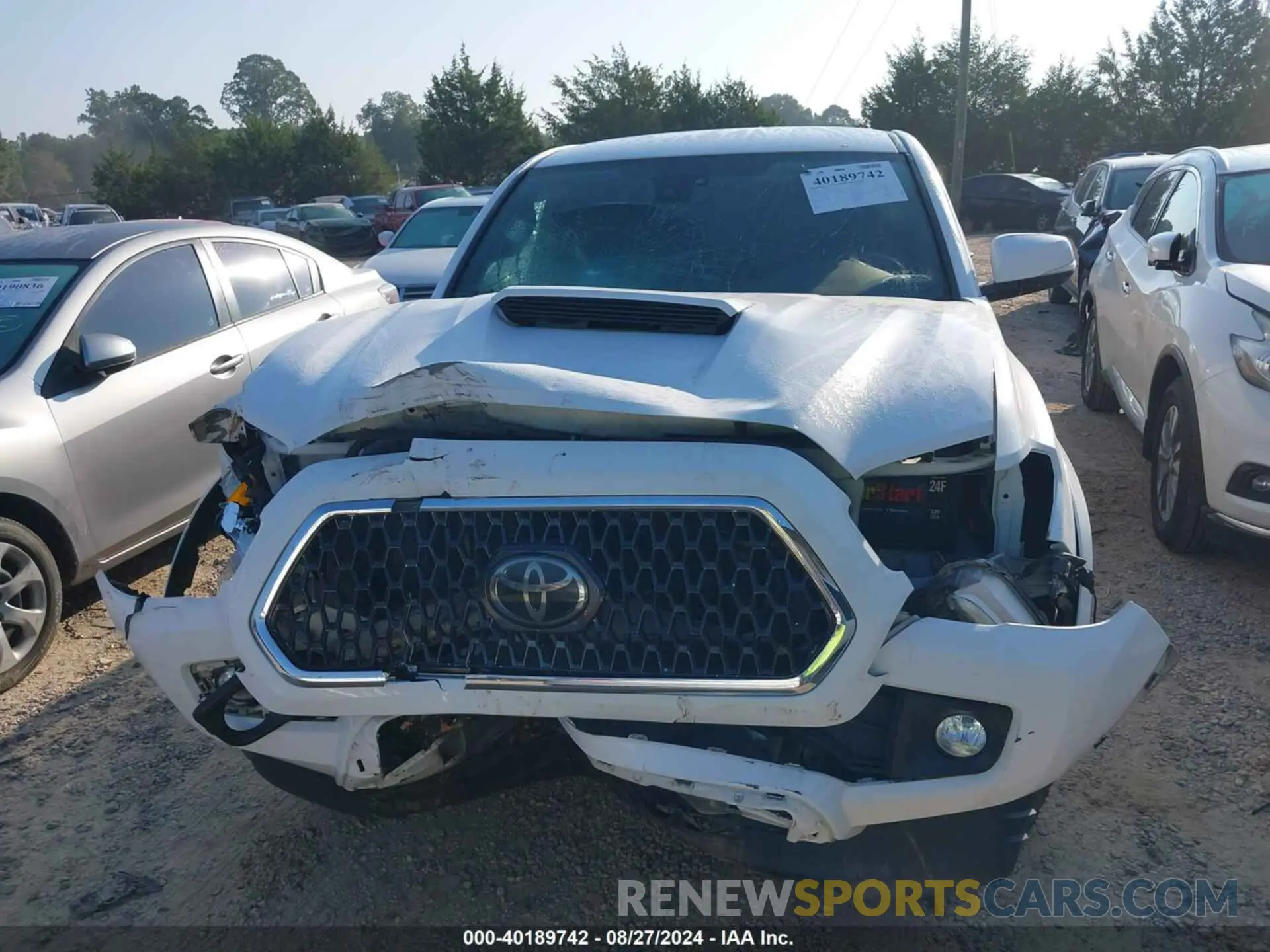 11 Photograph of a damaged car 3TMCZ5AN6KM219670 TOYOTA TACOMA 2019