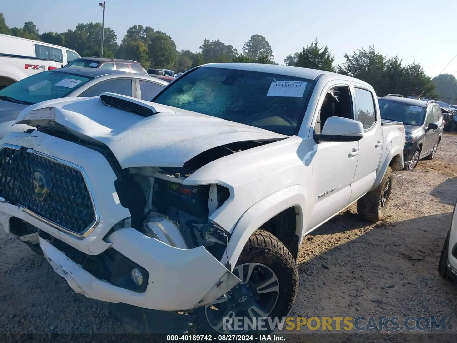 2 Photograph of a damaged car 3TMCZ5AN6KM219670 TOYOTA TACOMA 2019