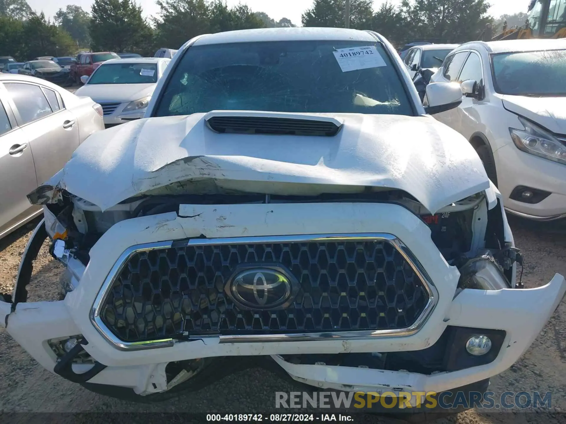 6 Photograph of a damaged car 3TMCZ5AN6KM219670 TOYOTA TACOMA 2019