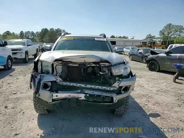 11 Photograph of a damaged car 3TMCZ5AN6KM249977 TOYOTA TACOMA 2019