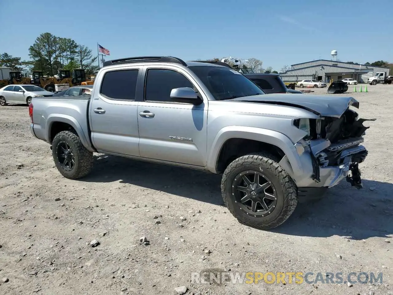 4 Photograph of a damaged car 3TMCZ5AN6KM249977 TOYOTA TACOMA 2019