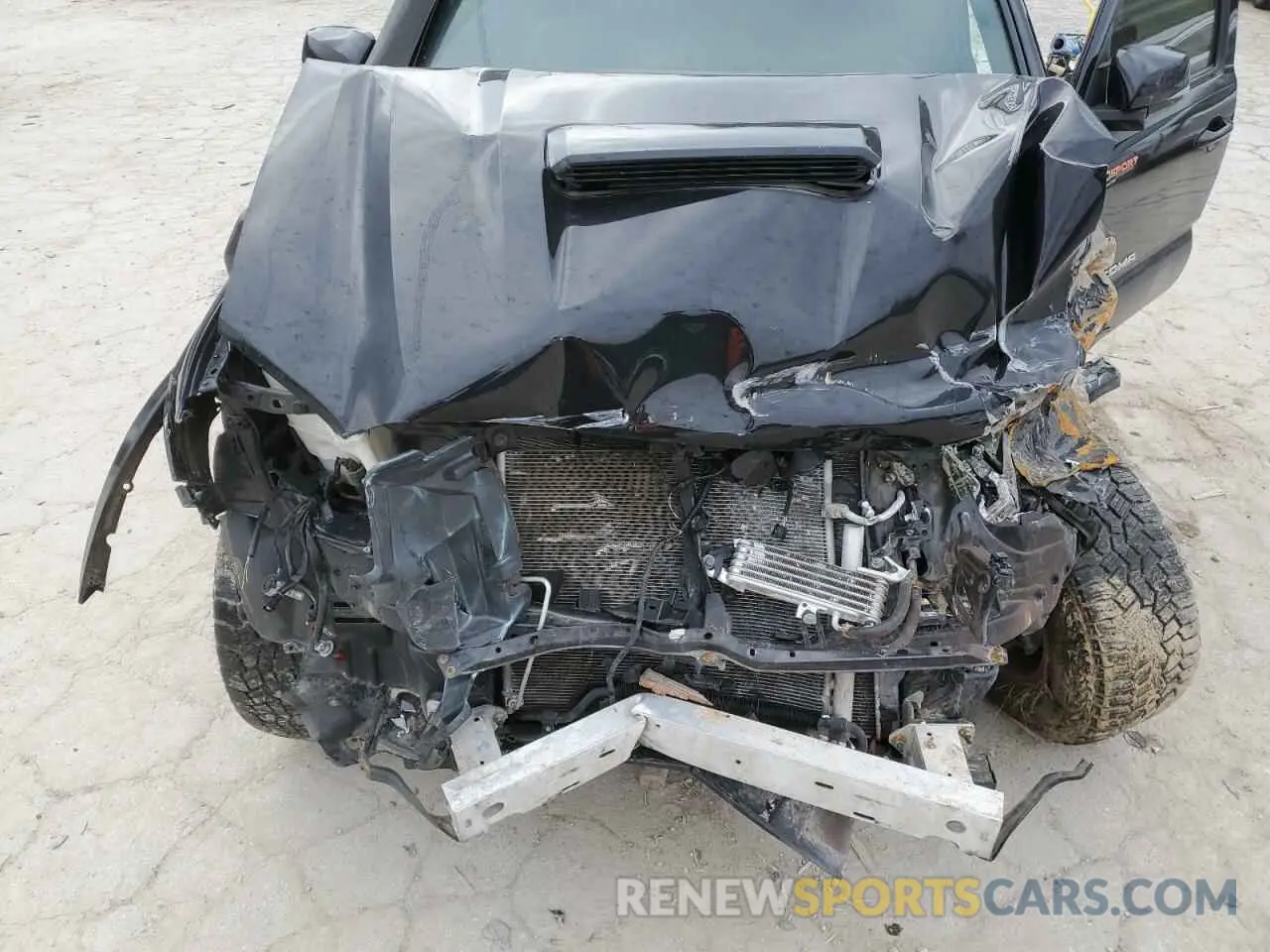 12 Photograph of a damaged car 3TMCZ5AN6KM259277 TOYOTA TACOMA 2019