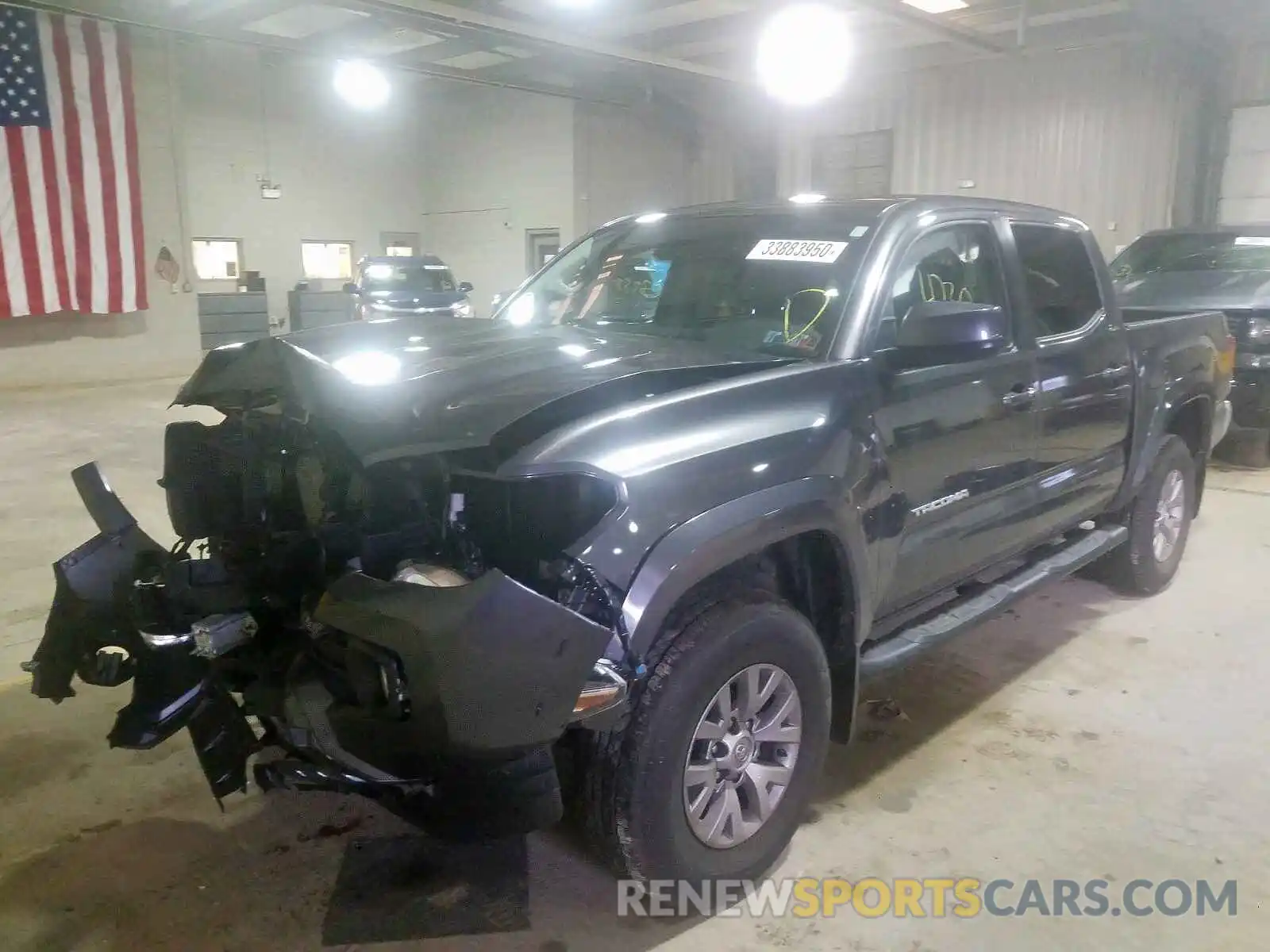 2 Photograph of a damaged car 3TMCZ5AN6KM272613 TOYOTA TACOMA 2019