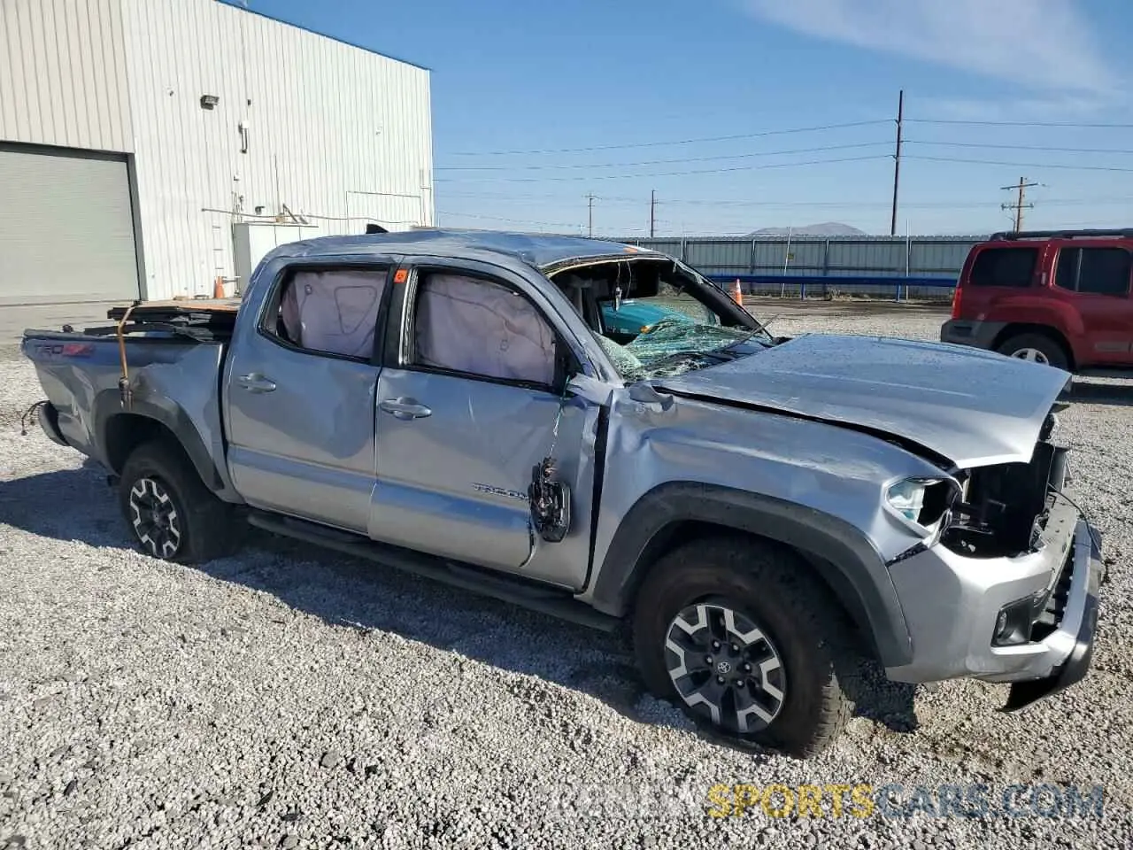 4 Photograph of a damaged car 3TMCZ5AN6KM275267 TOYOTA TACOMA 2019