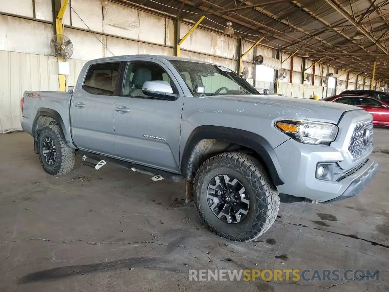 4 Photograph of a damaged car 3TMCZ5AN6KM282865 TOYOTA TACOMA 2019