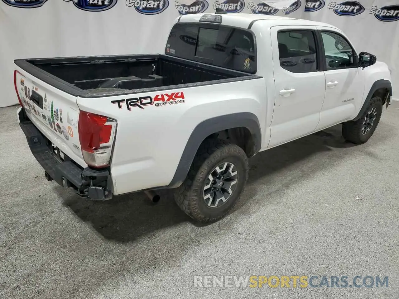 3 Photograph of a damaged car 3TMCZ5AN7KM197081 TOYOTA TACOMA 2019