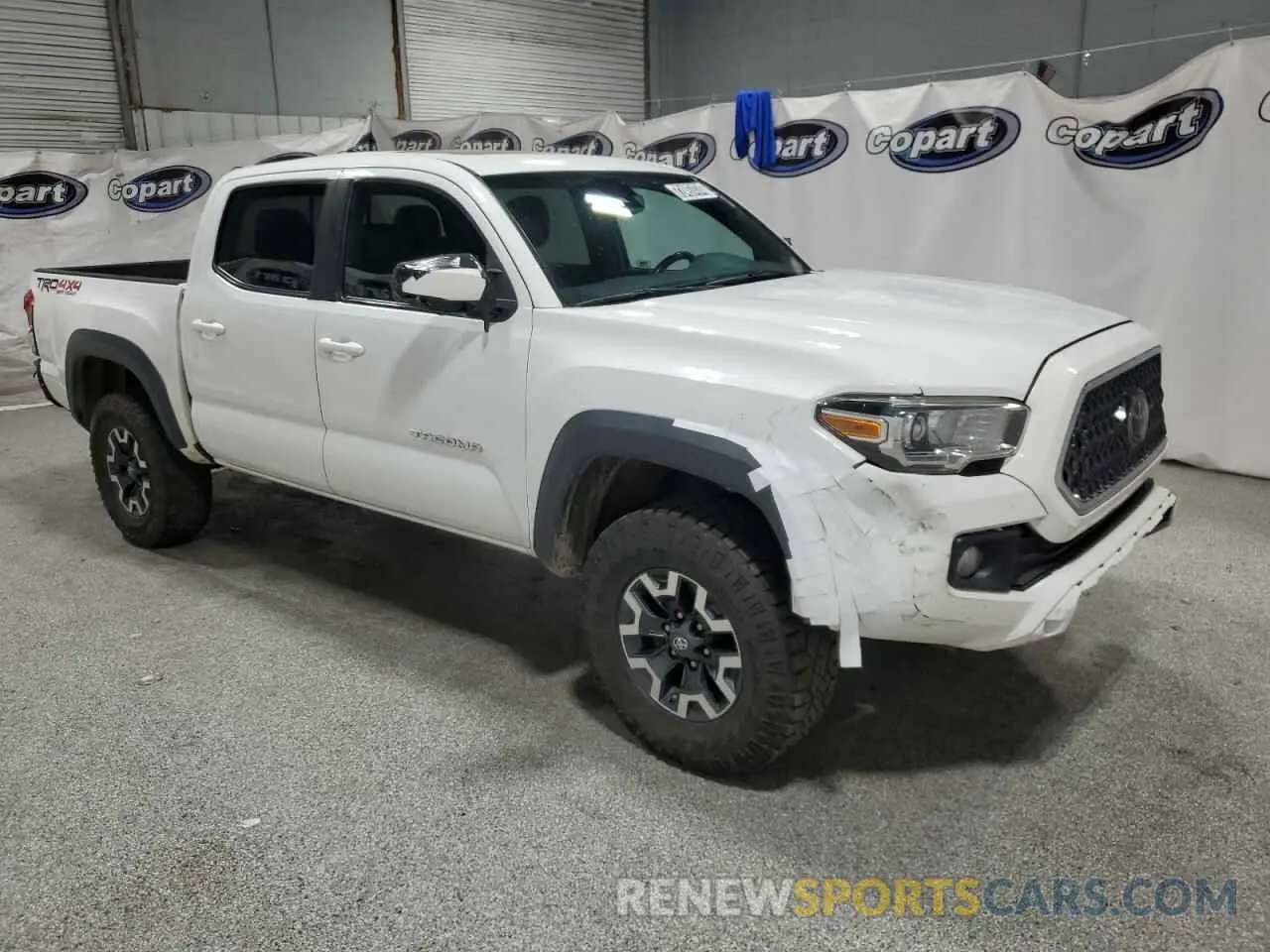 4 Photograph of a damaged car 3TMCZ5AN7KM197081 TOYOTA TACOMA 2019