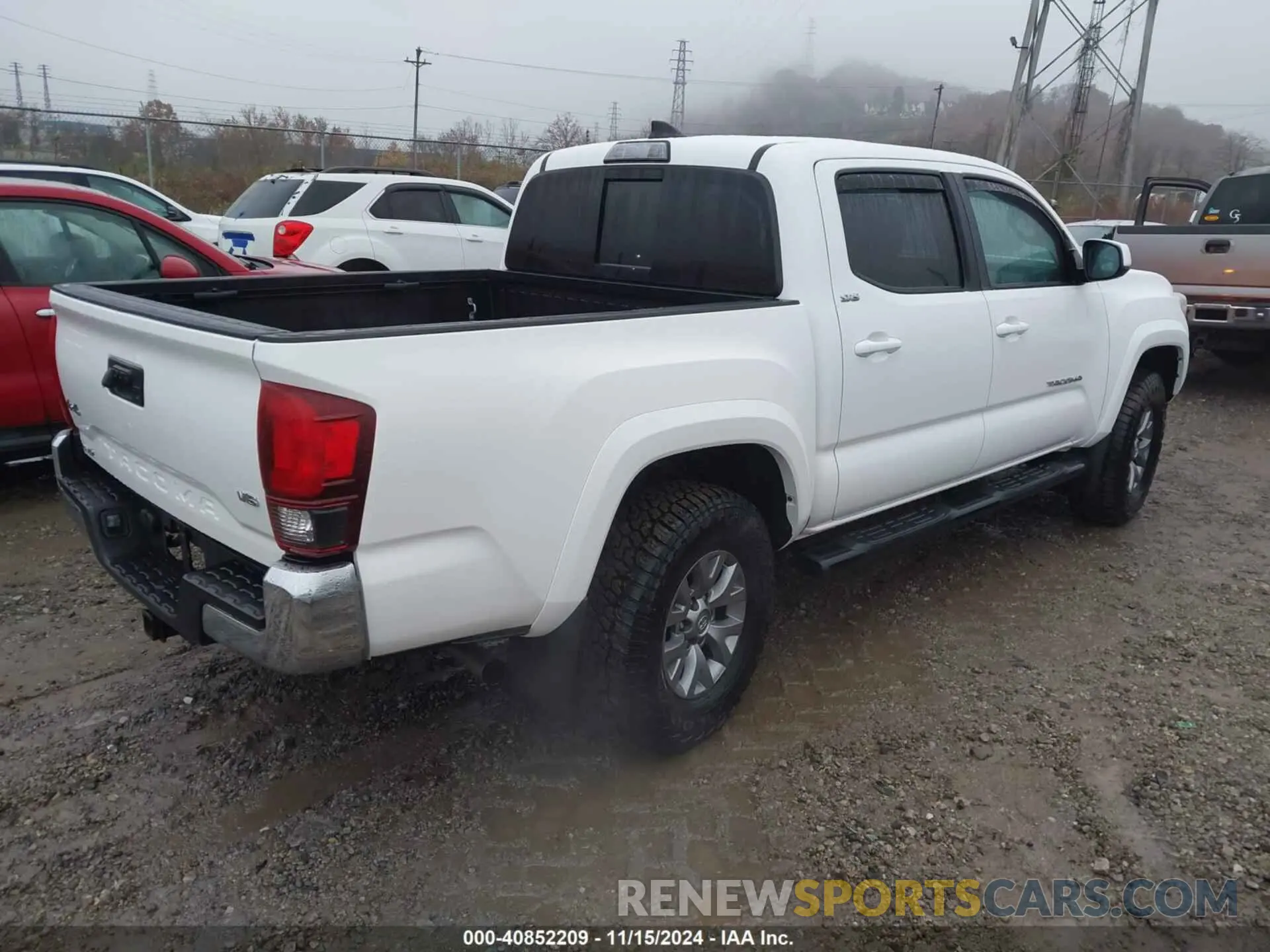 4 Photograph of a damaged car 3TMCZ5AN7KM205504 TOYOTA TACOMA 2019