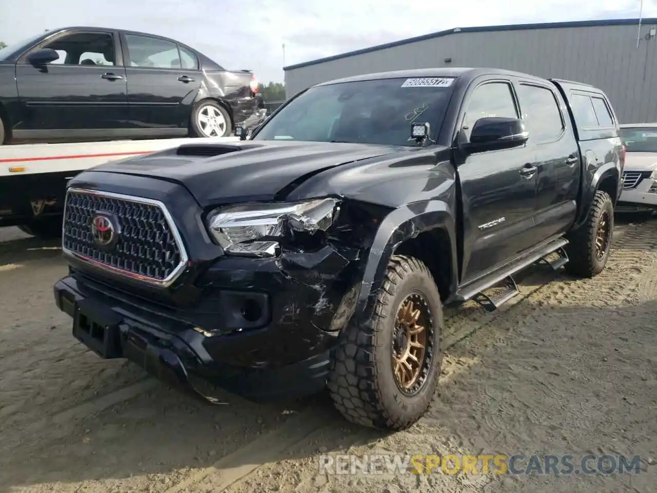 2 Photograph of a damaged car 3TMCZ5AN7KM221542 TOYOTA TACOMA 2019