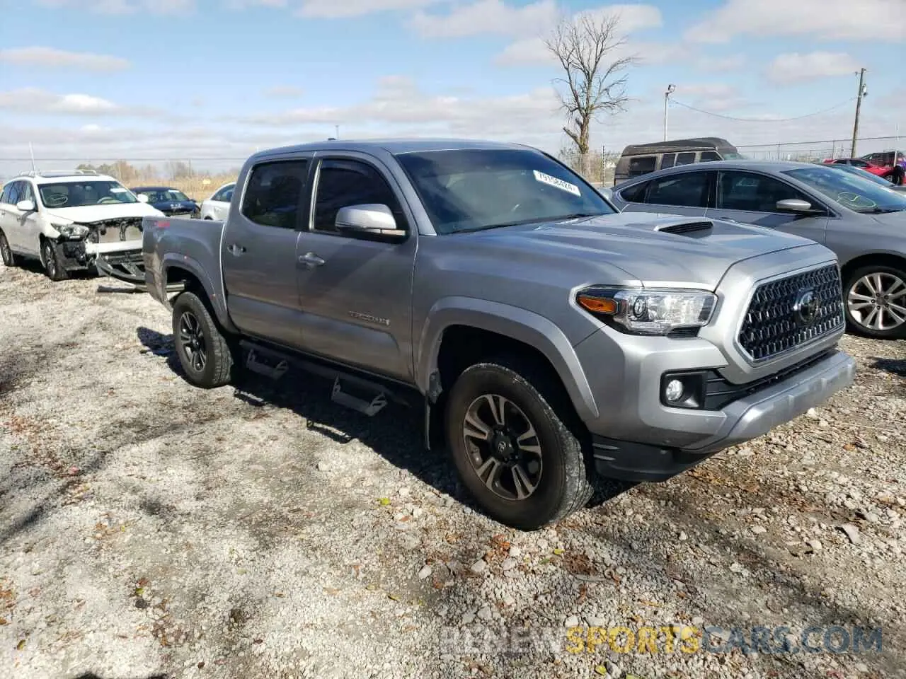 4 Photograph of a damaged car 3TMCZ5AN7KM235358 TOYOTA TACOMA 2019